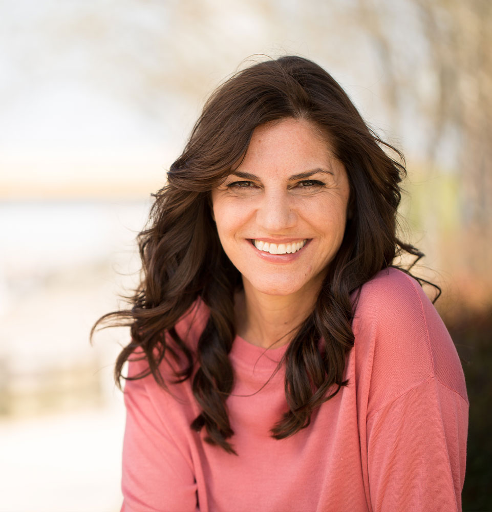 beautiful mature women smiling brightly outside
