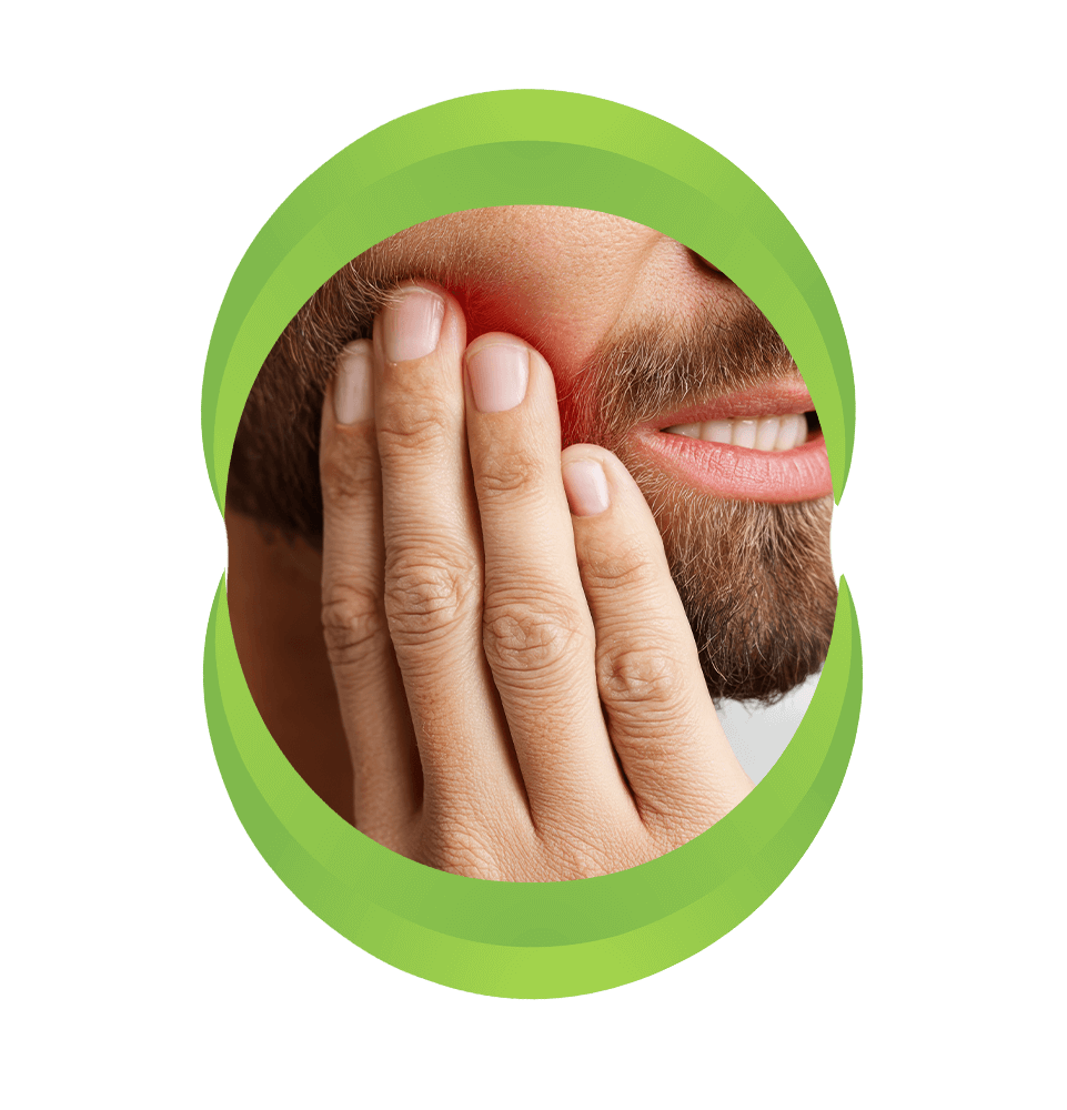 Grimacing bearded male with reddened cheek, showcasing intense dental discomfort